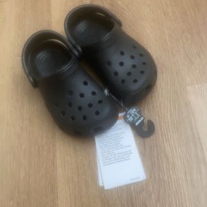 New crocs  with tags size c8 .